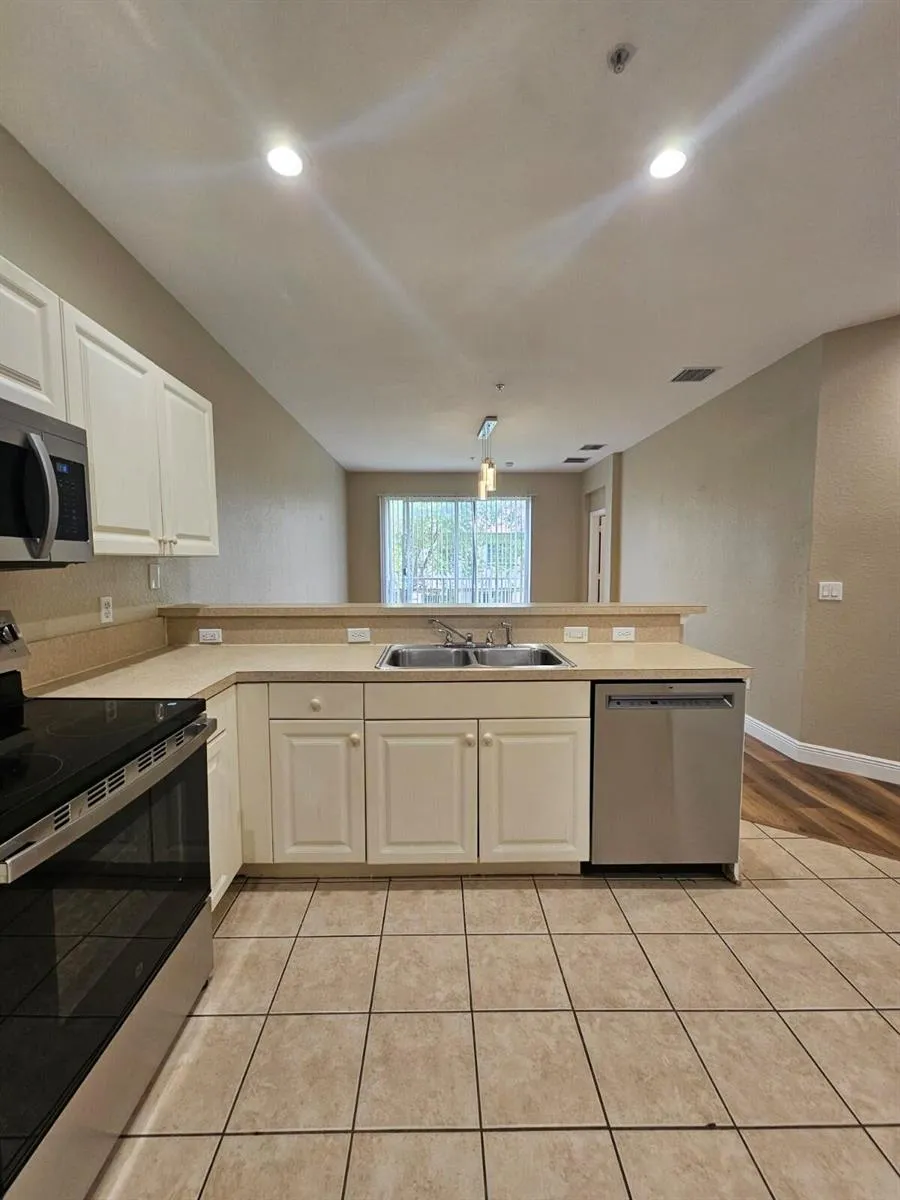 1967 FREEPORT DRIVE Riviera Beach, FL 33404