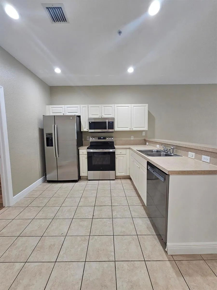 1967 FREEPORT DRIVE Riviera Beach, FL 33404