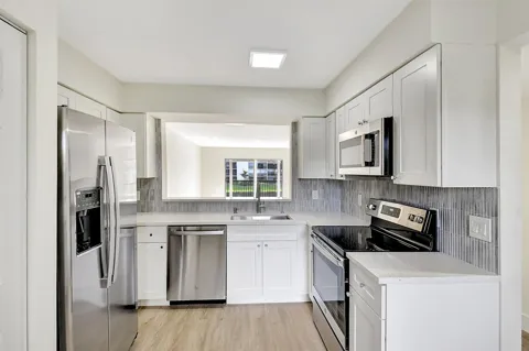 14360 STRATHMORE LANE #204