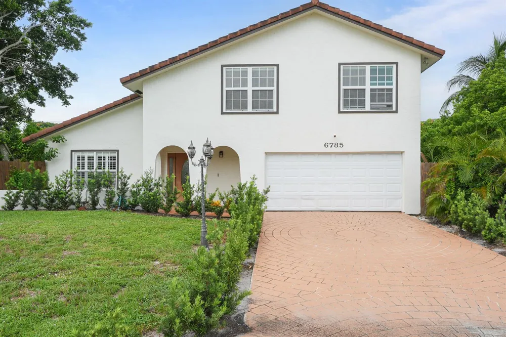 6785 ESCONDIDA DRIVE Lake Clarke Shores, FL 33406