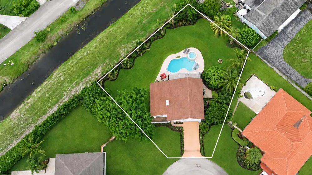 6785 ESCONDIDA DRIVE Lake Clarke Shores, FL 33406