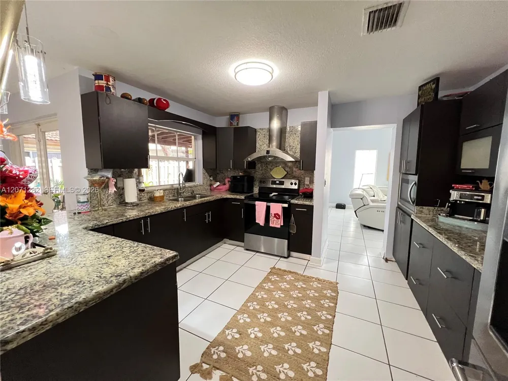 13249 NW 9 LN Miami, FL 33182