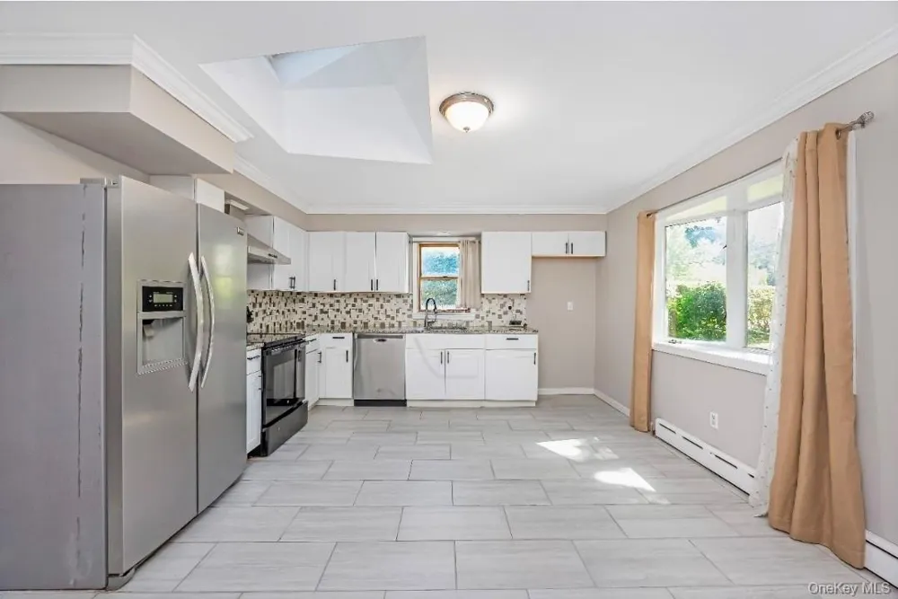 9 Half Moon Pond Road Ridge, NY 11961