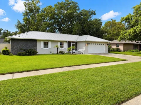 7640 VILLAGE GREEN DR