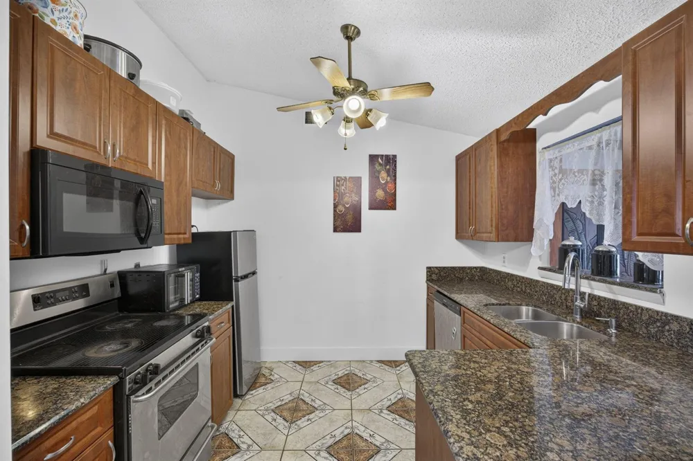 254 LA MANCHA AVENUE Royal Palm Beach, FL 33411