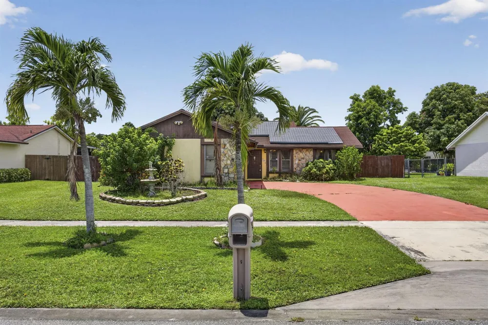 254 LA MANCHA AVENUE Royal Palm Beach, FL 33411