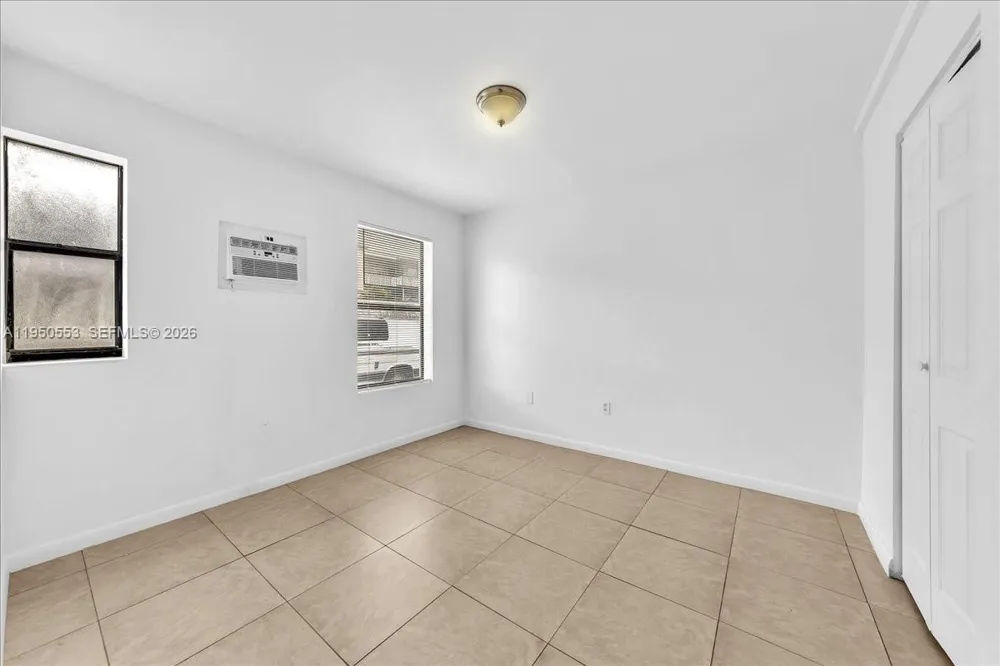 365 NW 8th St #202 Miami, FL 33136
