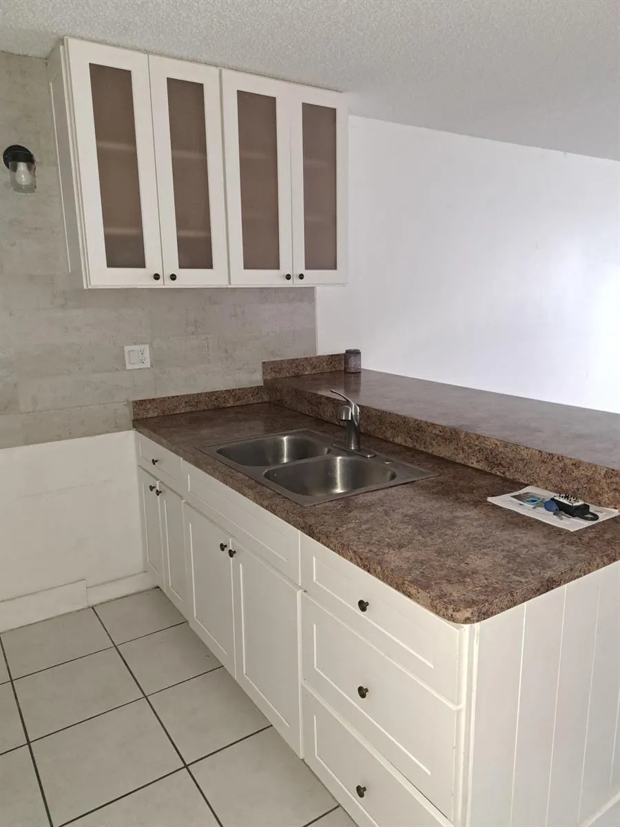 2701 RIVERSIDE DRIVE #105-B Coral Springs, FL 33065
