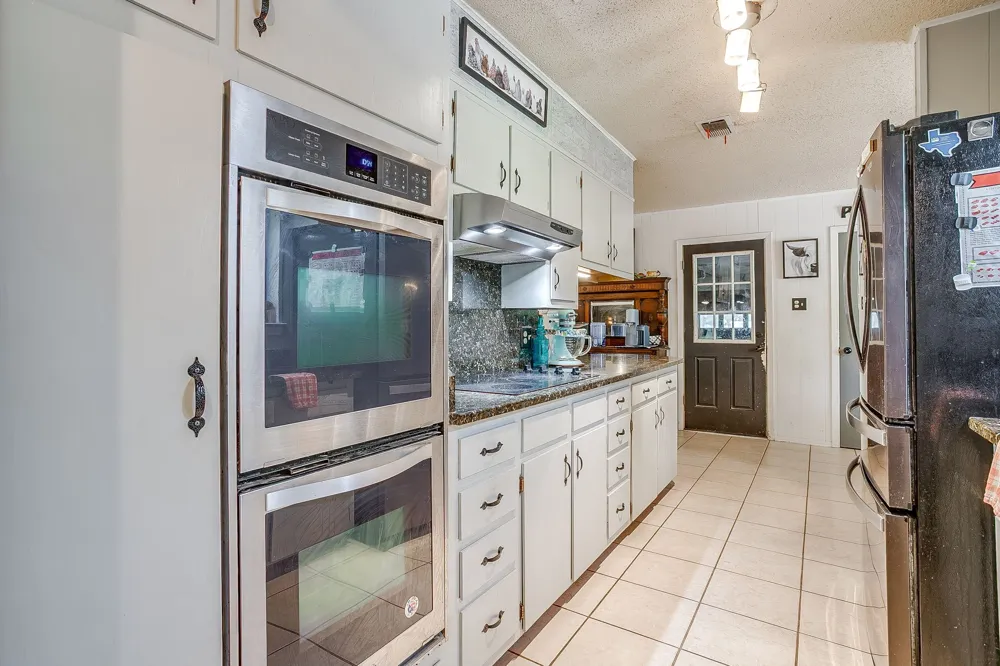 1377 E Gibtown Road Poolville, TX 76487