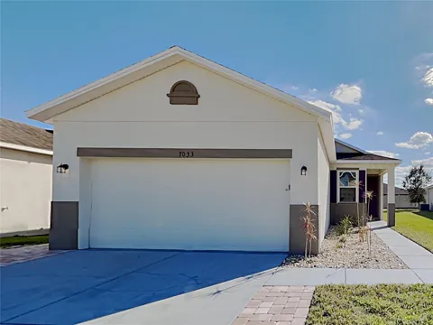 7033 FEATHER WOOD DRIVE