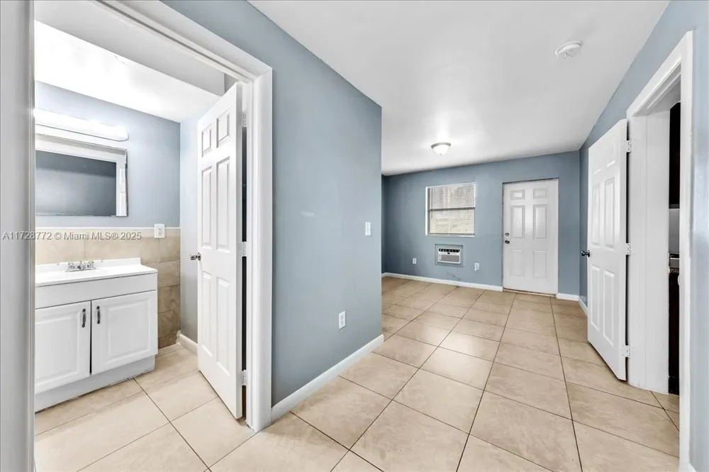 365 NW 8th St #211 Miami, FL 33136