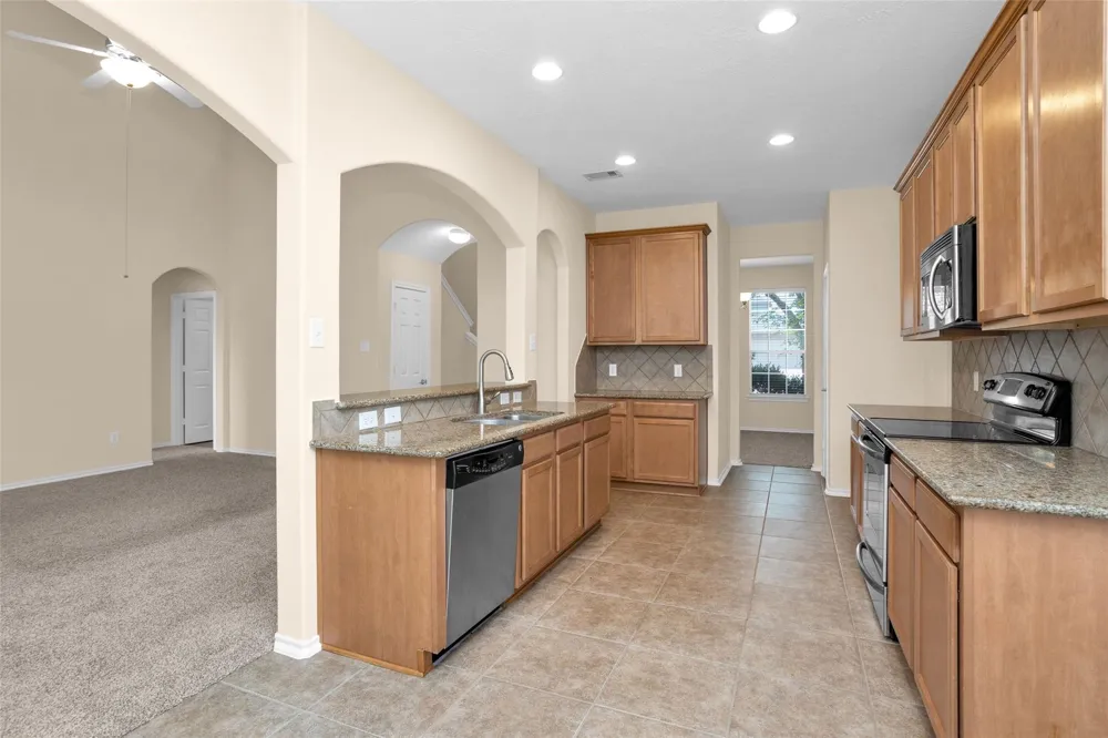 8927 Headstall Drive Tomball, TX 77375