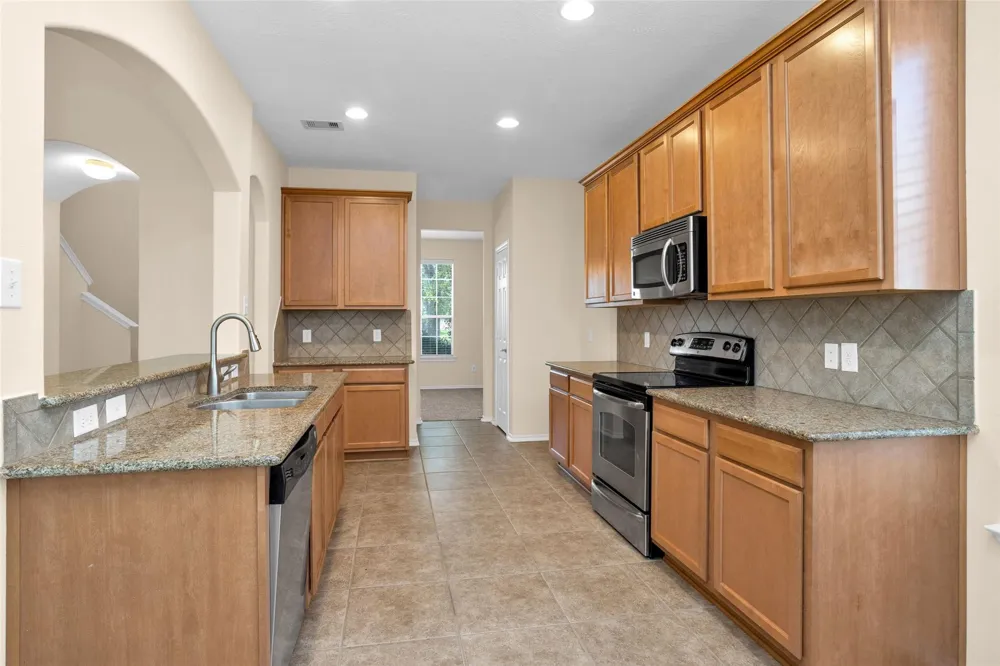 8927 Headstall Drive Tomball, TX 77375