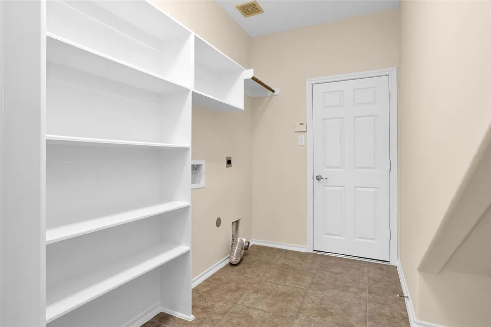8927 Headstall Drive Tomball, TX 77375
