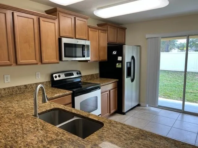 7734 MAROON PEAK DRIVE Ruskin, FL 33573