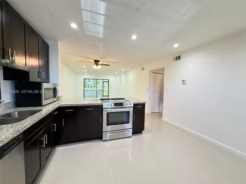 6095 Sabal Palm Blvd #103