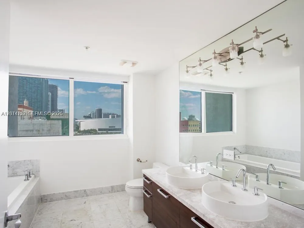 244 Biscayne Blvd #1002 Miami, FL 33132