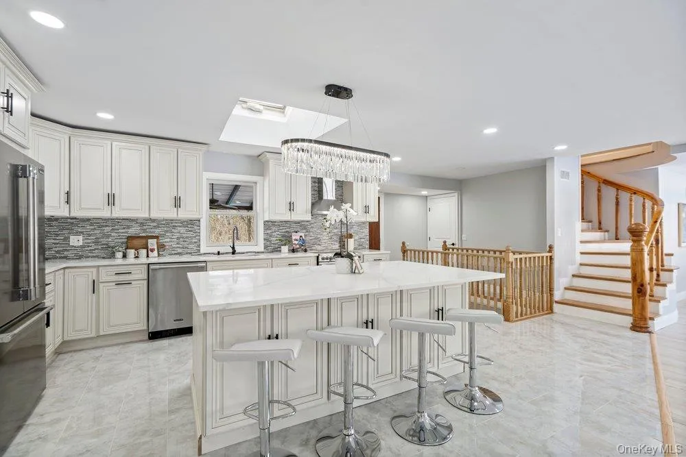 497 Woodbury Road Cold Spring Harbor, NY 11724