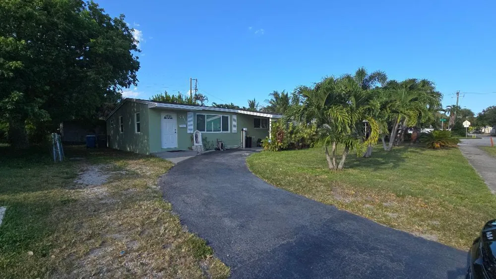 911 NE 58TH STREET Oakland Park, FL 33334