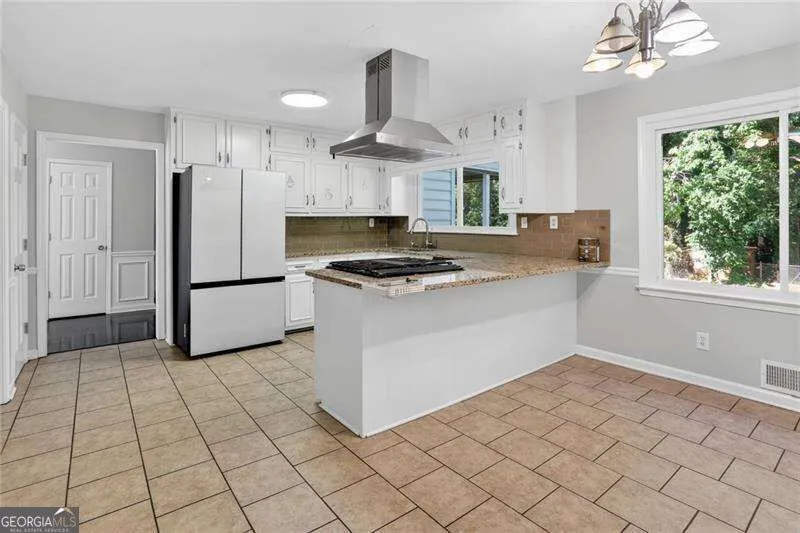 2223 Angela DR SW Lilburn, GA 30047