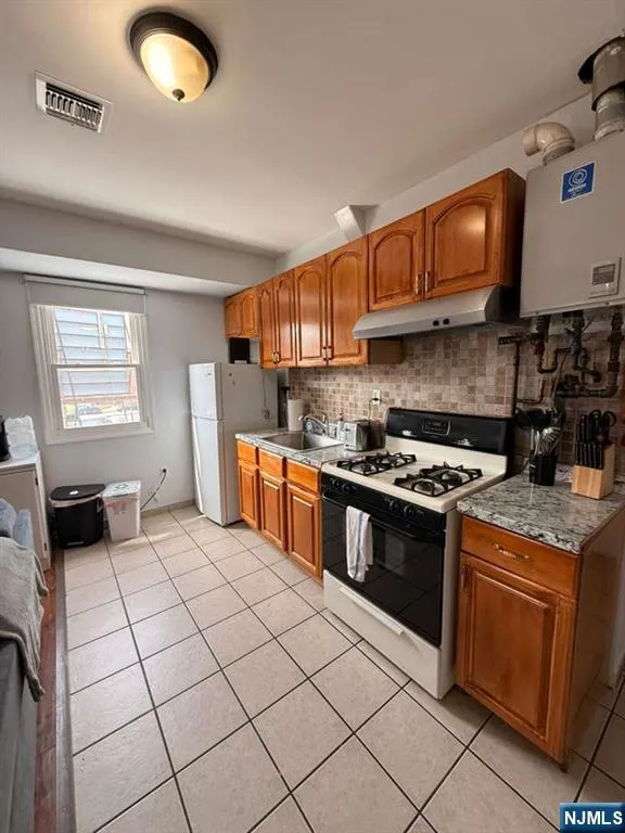 296 Passaic Street 3 Passaic, NJ 07055
