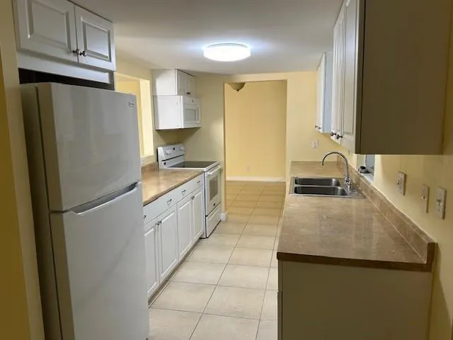 7013 NW 63RD COURT Tamarac, FL 33321