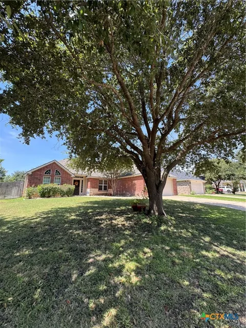 5704 Meadow Wood Drive