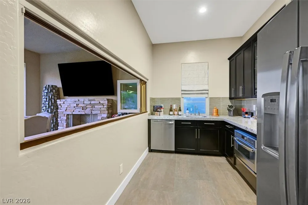 24 OLYMPIA RIDGE DRIVE Las Vegas, NV 89141