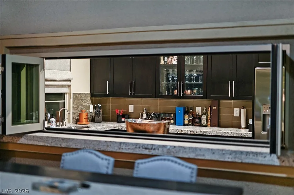 24 OLYMPIA RIDGE DRIVE Las Vegas, NV 89141