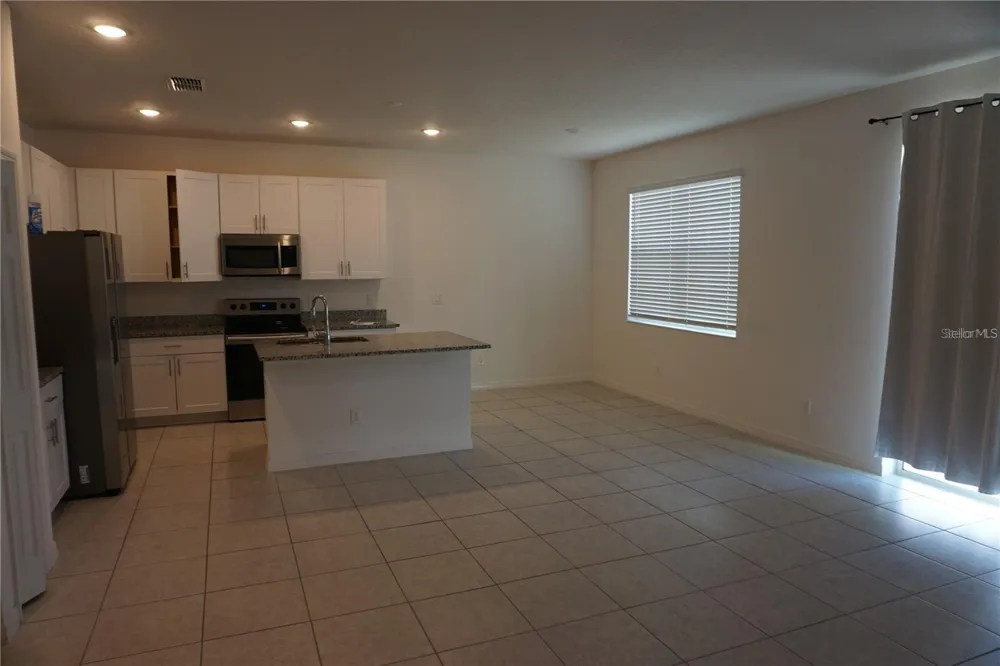 1677 WAY OF PEACE LANE Mascotte, FL 34753