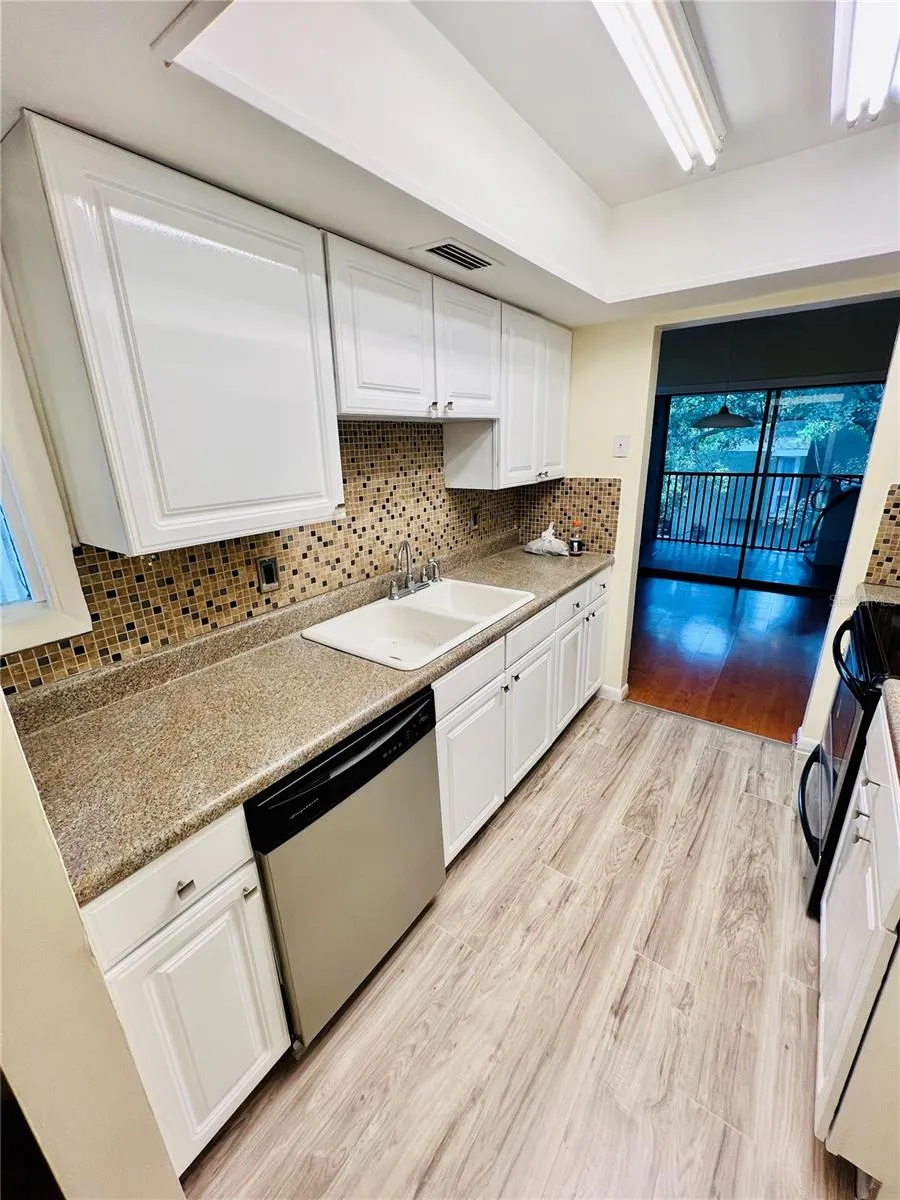6057 WINDHOVER DRIVE #E-08 Orlando, FL 32819