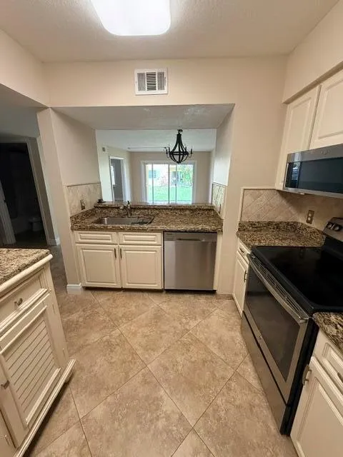 1035 LAKE SHORE DRIVE #103 Lake Park, FL 33403
