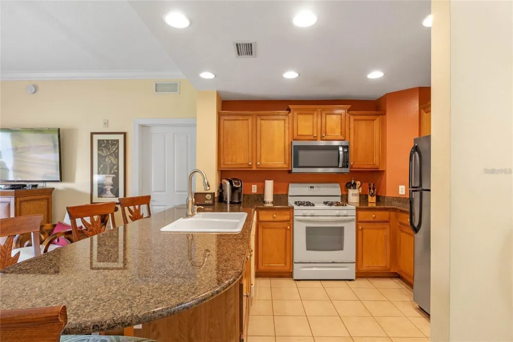 1598 HERITAGE CROSSING COURT #102 Kissimmee, FL 34747