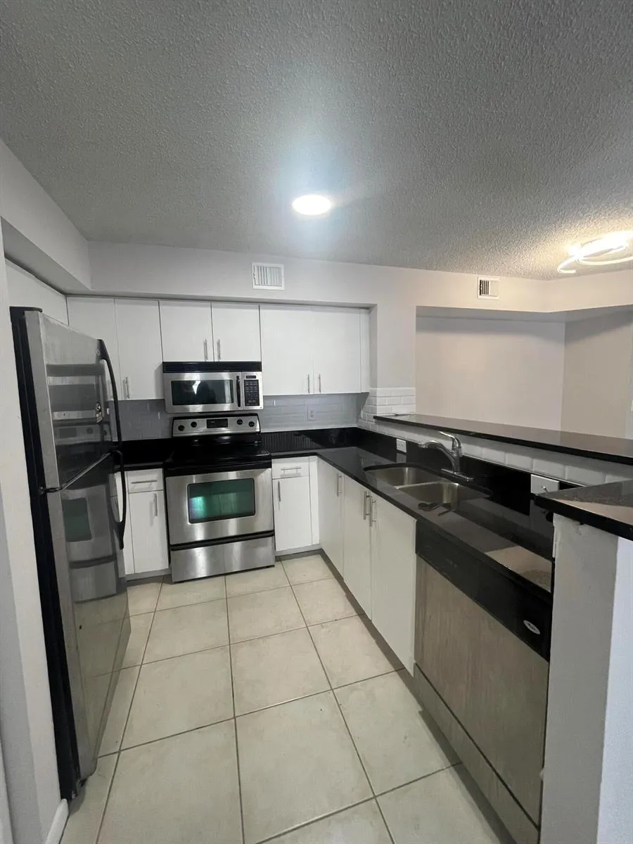 1755 VILLAGE BOULEVARD #206 West Palm Beach, FL 33409