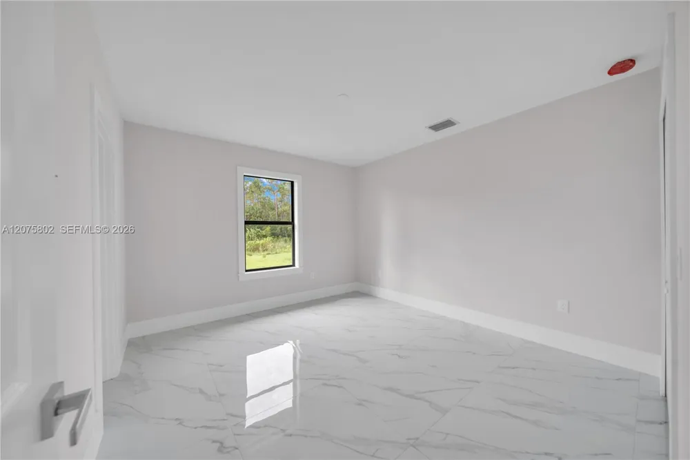 457 Woodman DR Lehigh Acres, FL 33972