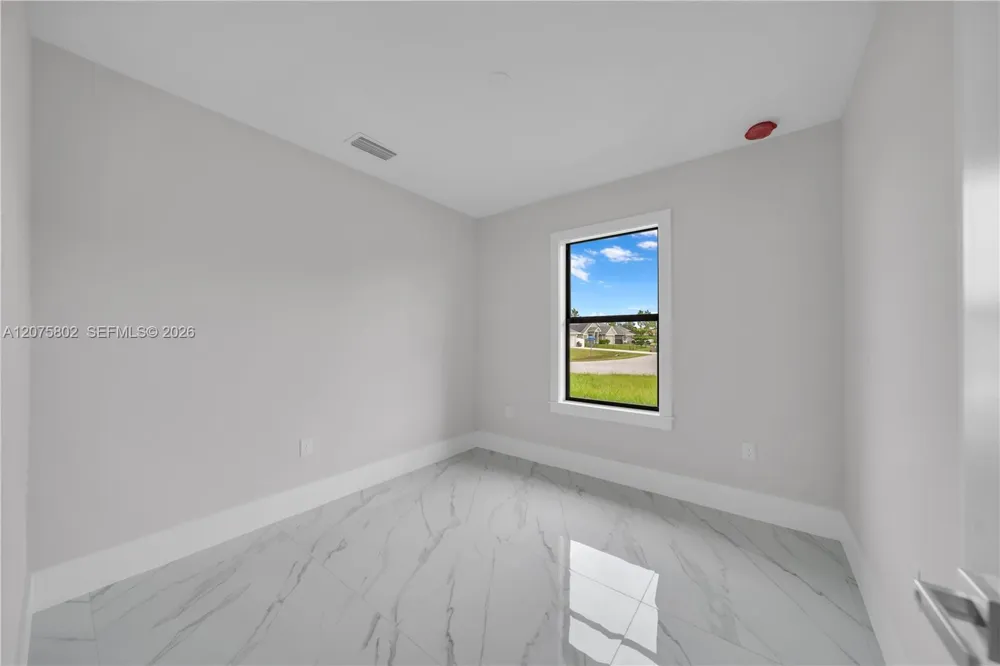 457 Woodman DR Lehigh Acres, FL 33972