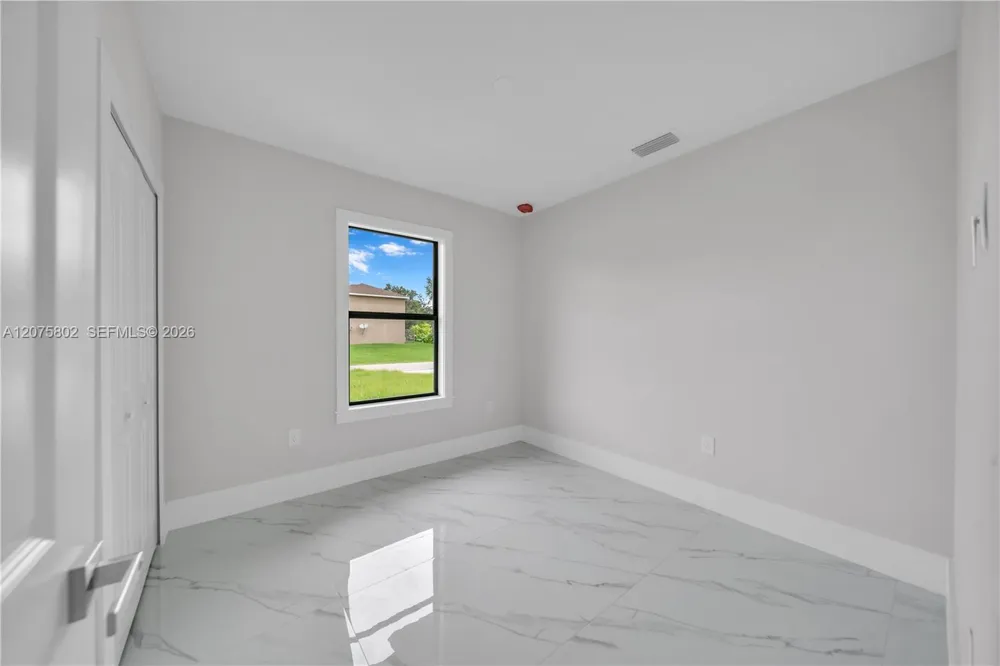 457 Woodman DR Lehigh Acres, FL 33972