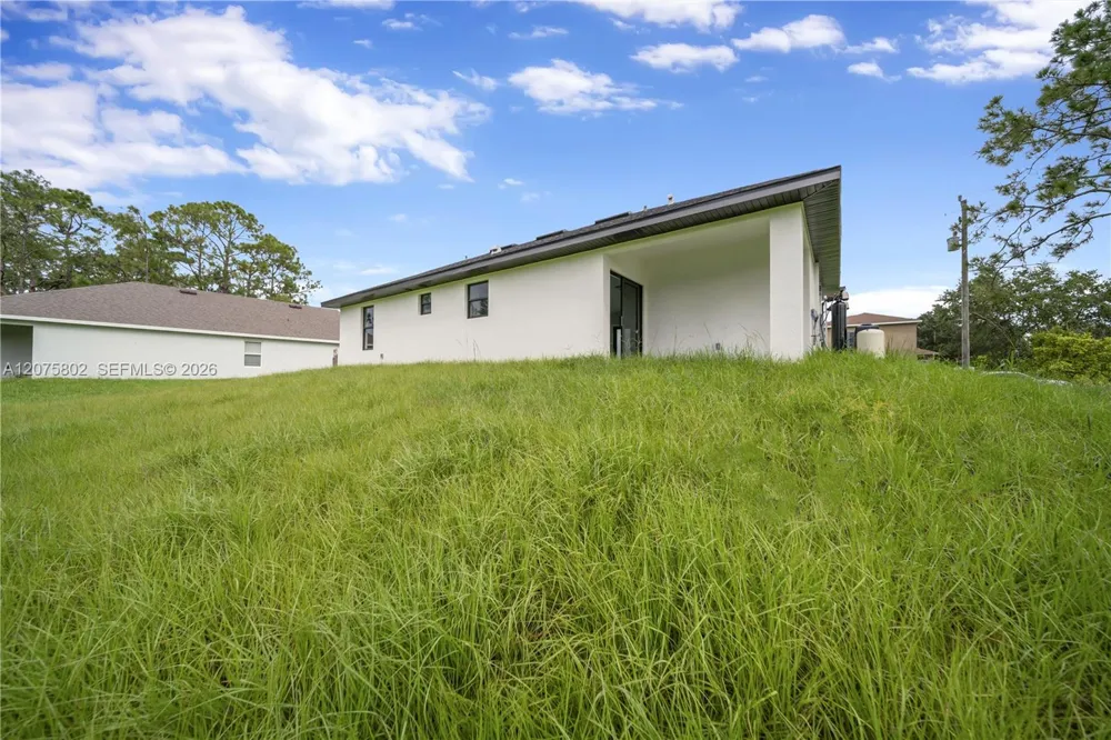 457 Woodman DR Lehigh Acres, FL 33972