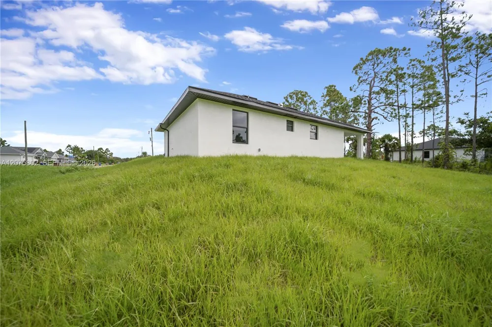 457 Woodman DR Lehigh Acres, FL 33972