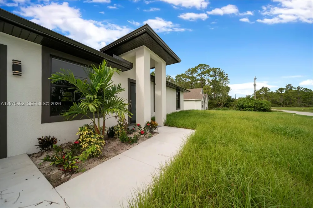 457 Woodman DR Lehigh Acres, FL 33972