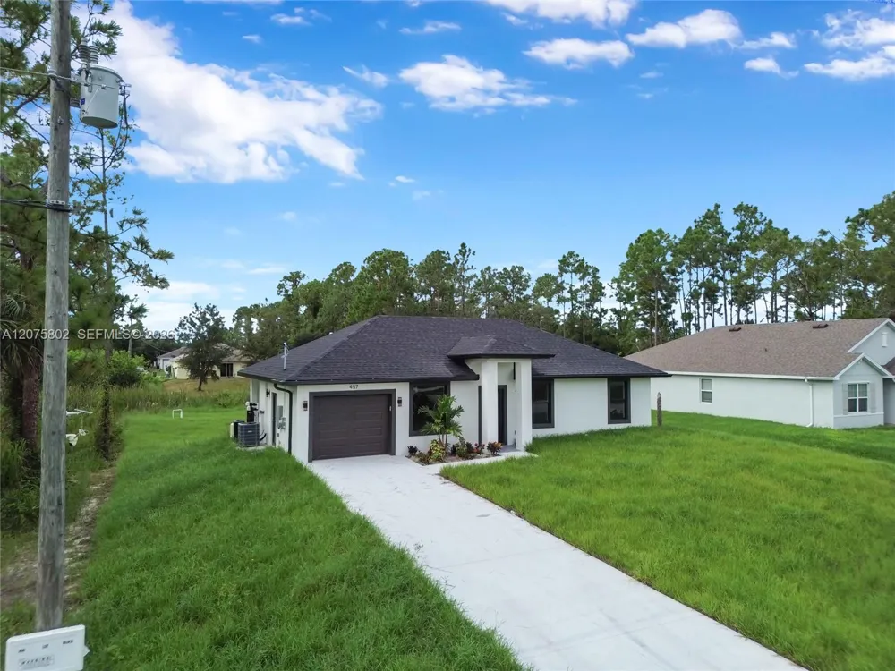 457 Woodman DR Lehigh Acres, FL 33972