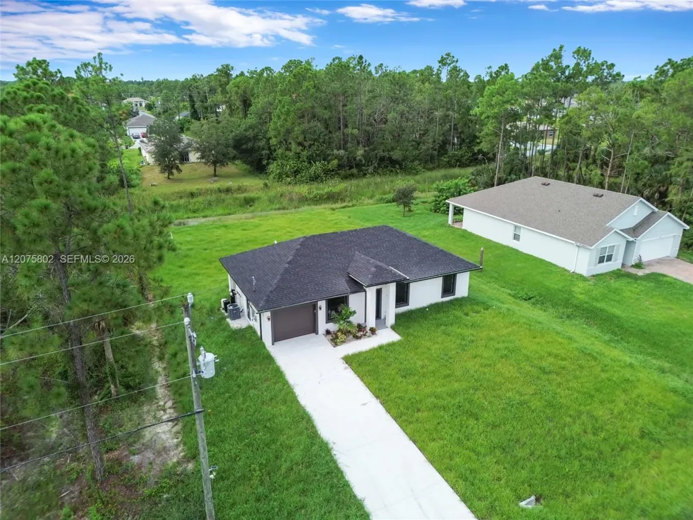 457 Woodman DR Lehigh Acres, FL 33972