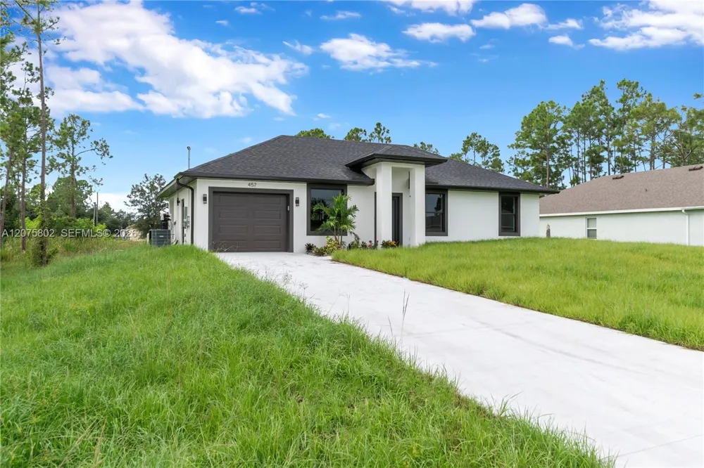 457 Woodman DR Lehigh Acres, FL 33972