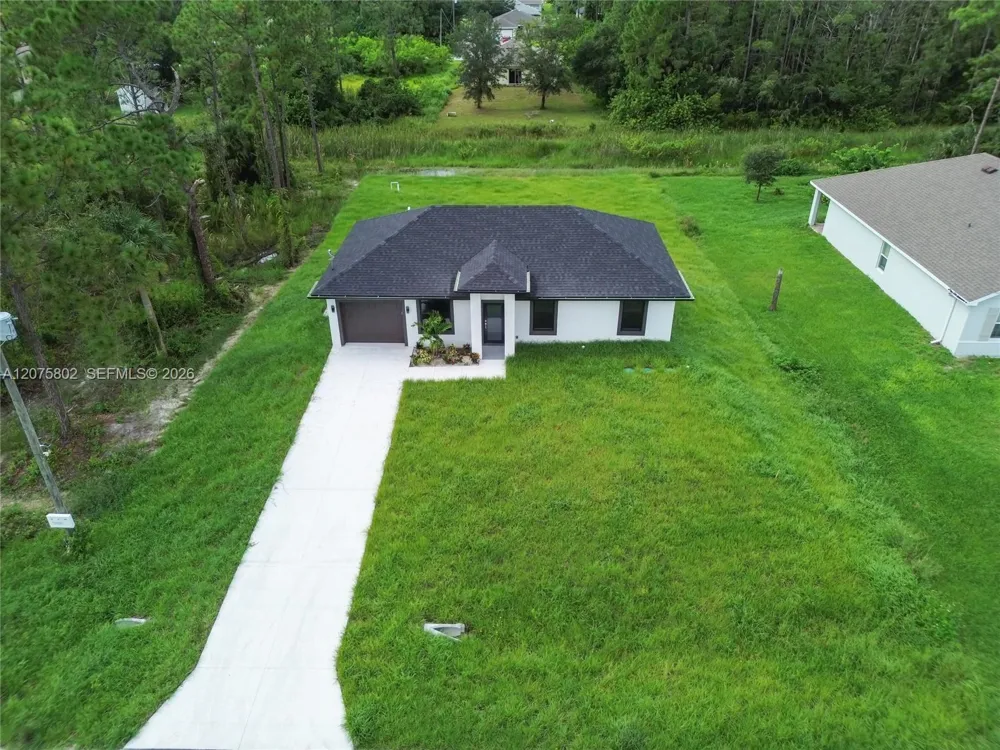 457 Woodman DR Lehigh Acres, FL 33972