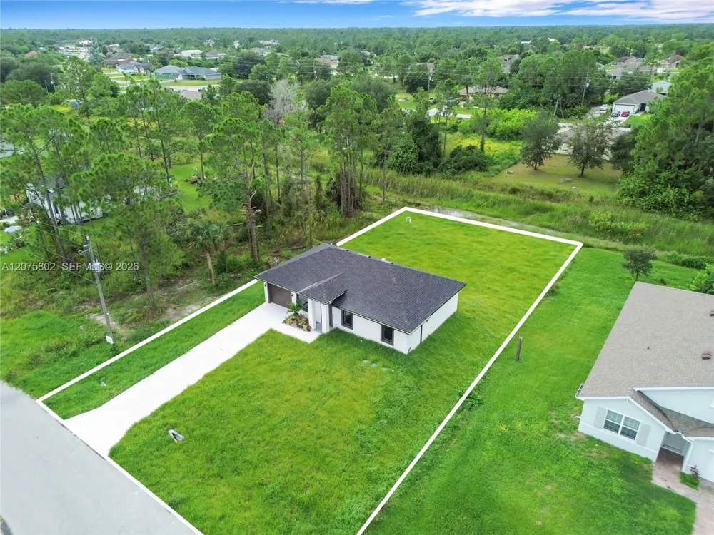 457 Woodman DR Lehigh Acres, FL 33972