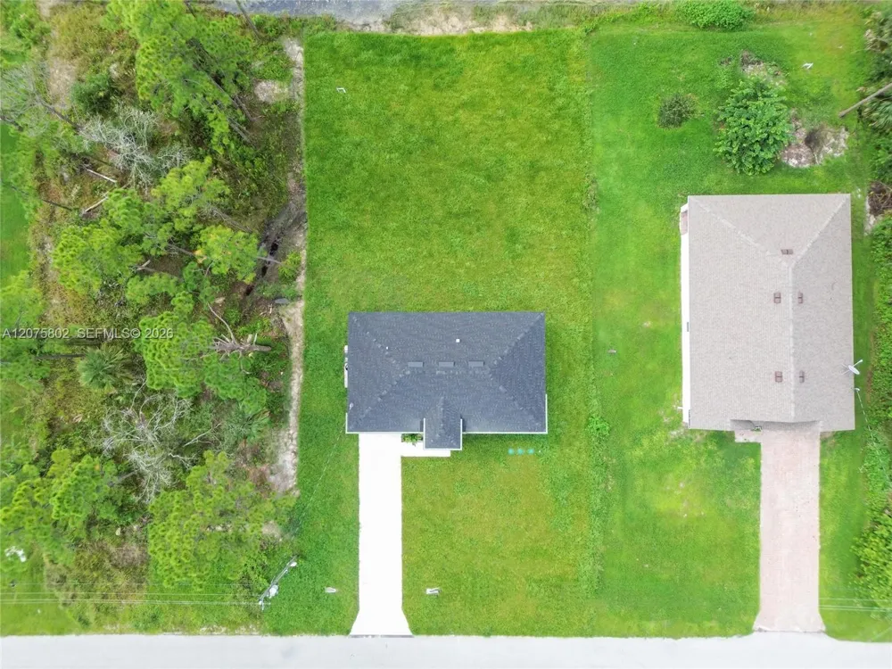 457 Woodman DR Lehigh Acres, FL 33972