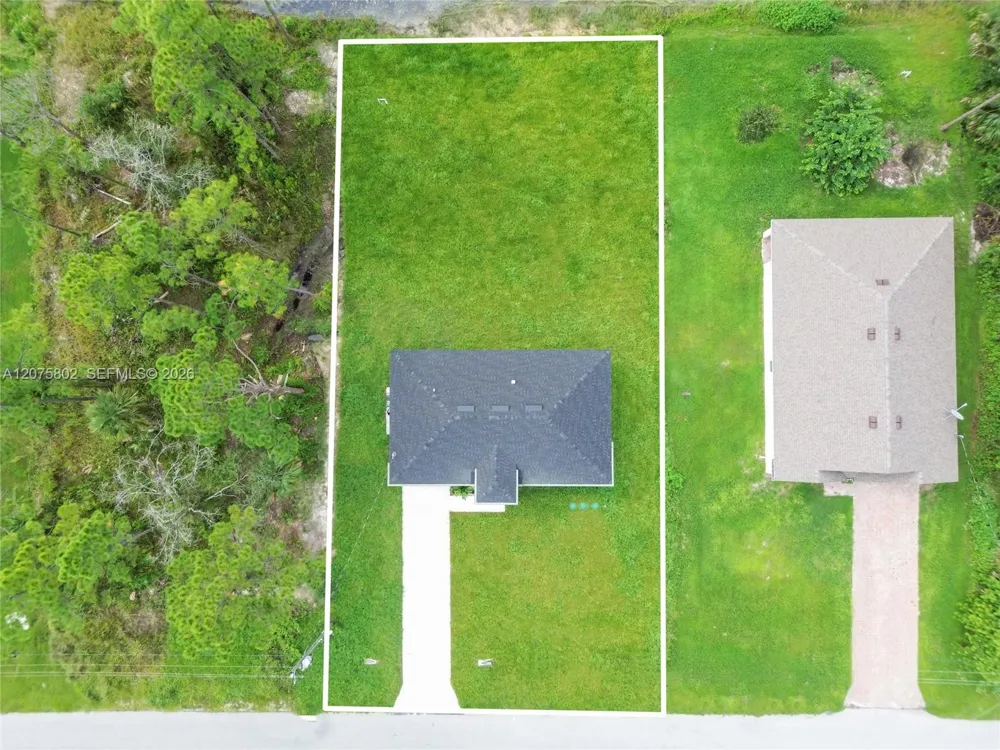 457 Woodman DR Lehigh Acres, FL 33972