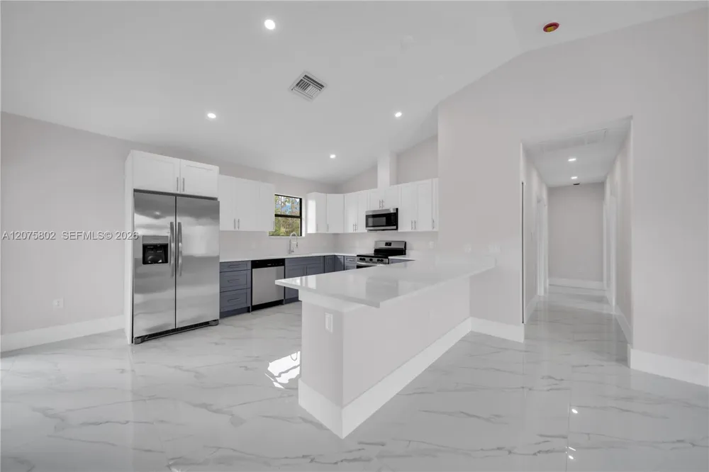457 Woodman DR Lehigh Acres, FL 33972