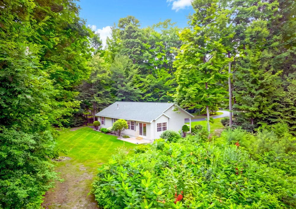 9479 Woodys Run Long Lake Township, MI 49684