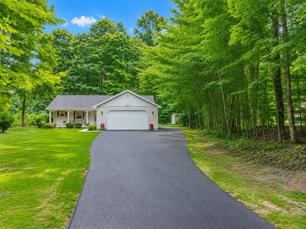 9479 Woodys Run Long Lake Township, MI 49684